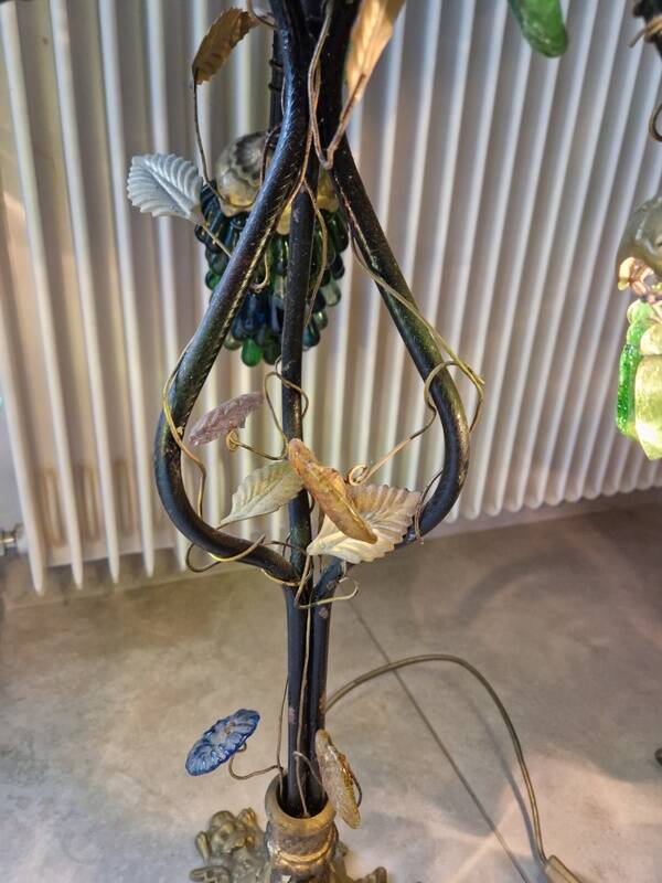 Bronze table lamp and Murano glass grape clusters.