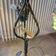 Bronze table lamp and Murano glass grape clusters.