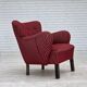 Fauteuil danois des années 1960, en laine de meuble rayée rouge, pieds en bois de chêne.