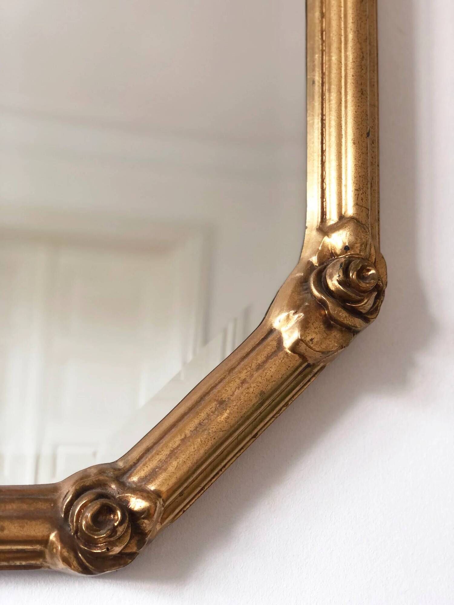 Vintage octagonal giltwood bevelled mirror with rose accents