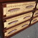 Six-drawer mahogany and straw chest of drawers, circa 1950, made in Mexico