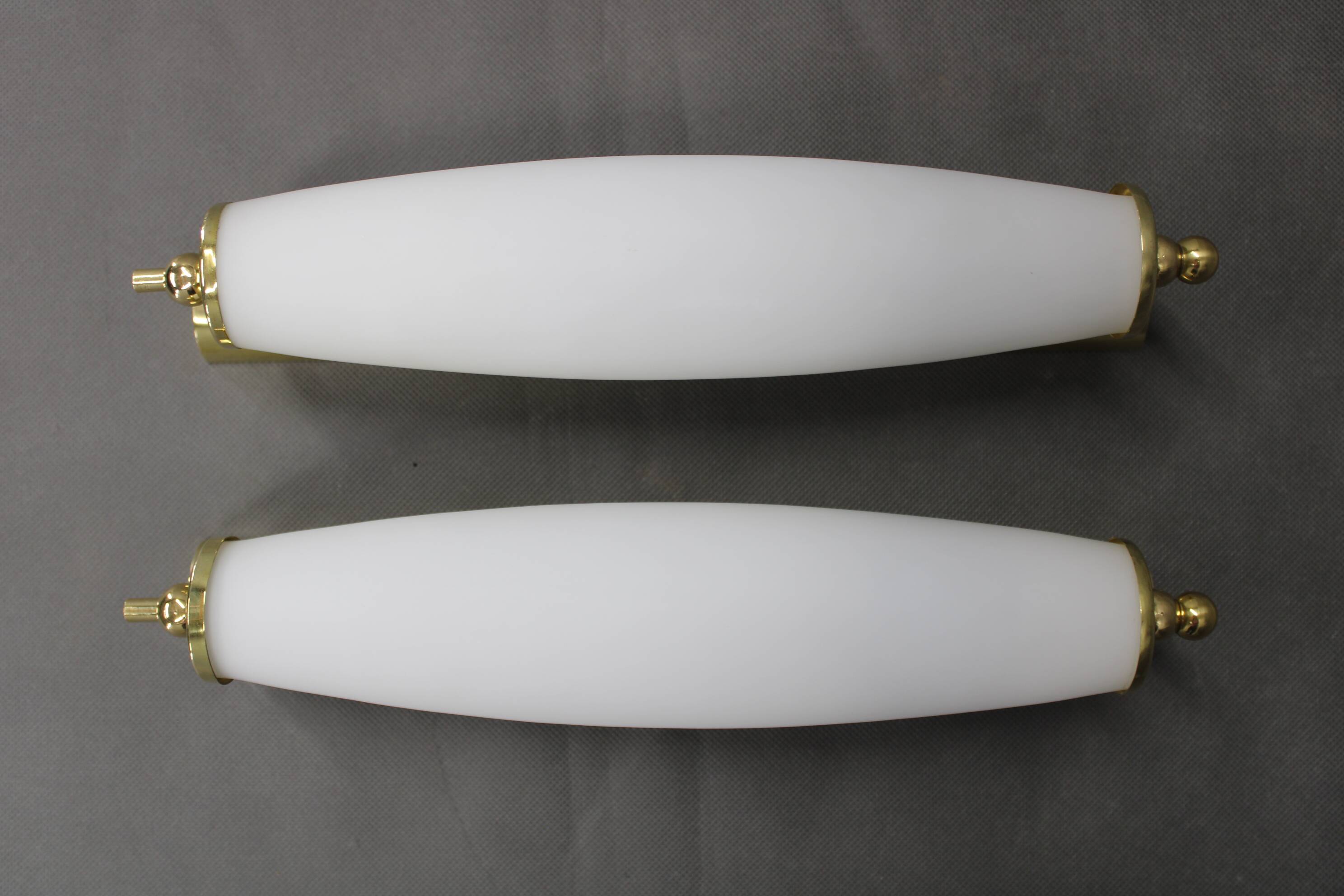 Italian Art Deco brass wall sconces with opal glass, 1940s.