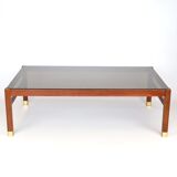 Table basse en palissandre et verre fumé