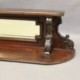 Display shelf with beveled mirror