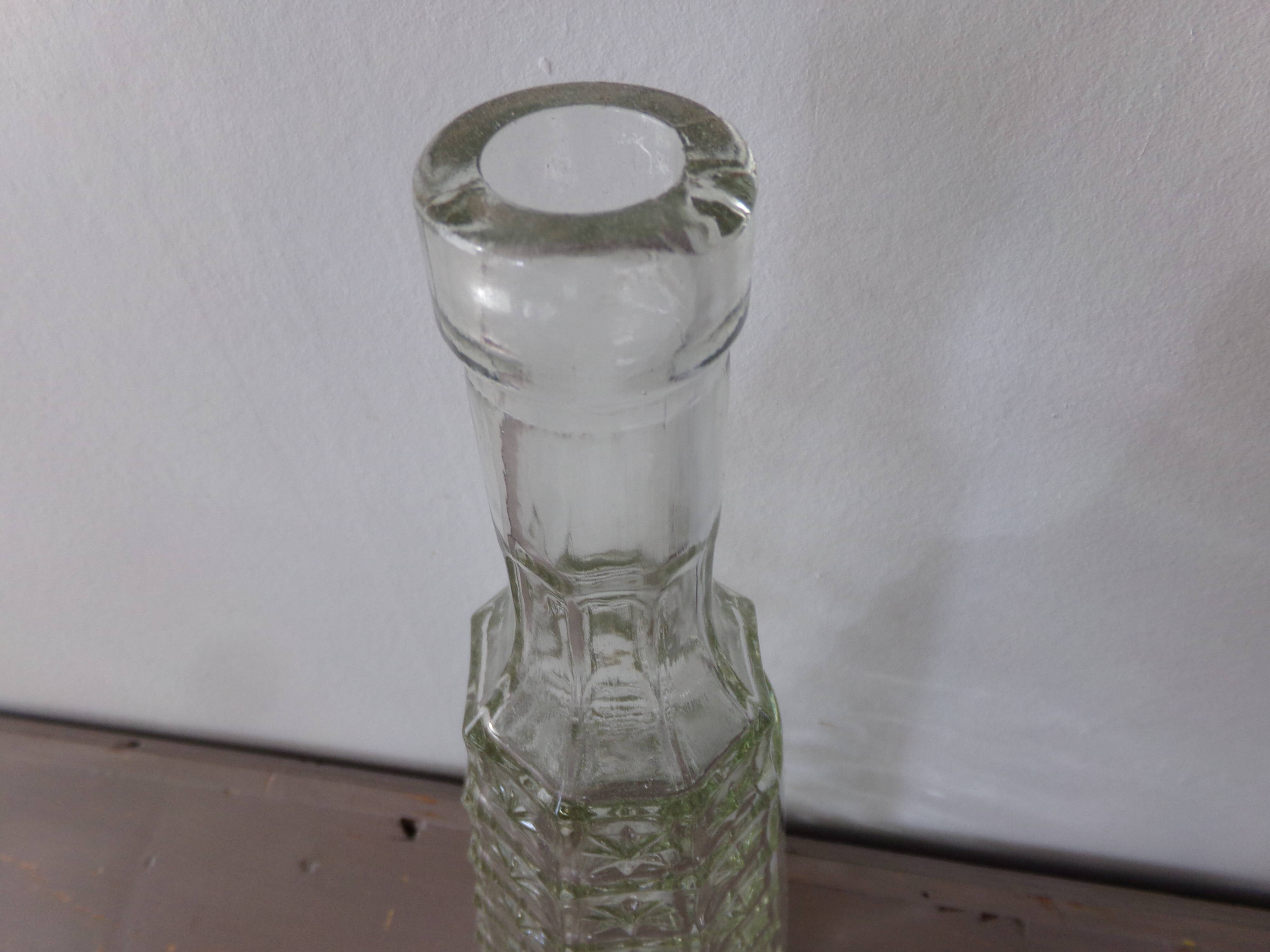 Chiseled glass bottle