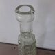Chiseled glass bottle