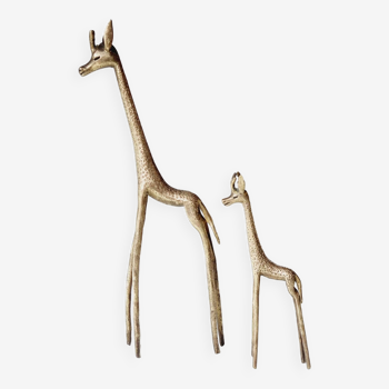 Stylized brass giraffes