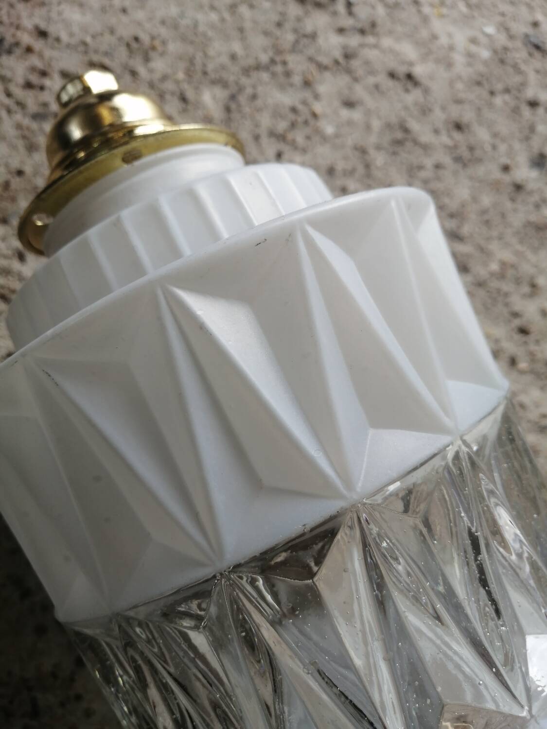 Vintage globe pendant light in molded glass.
