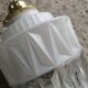 Vintage globe pendant light in molded glass.