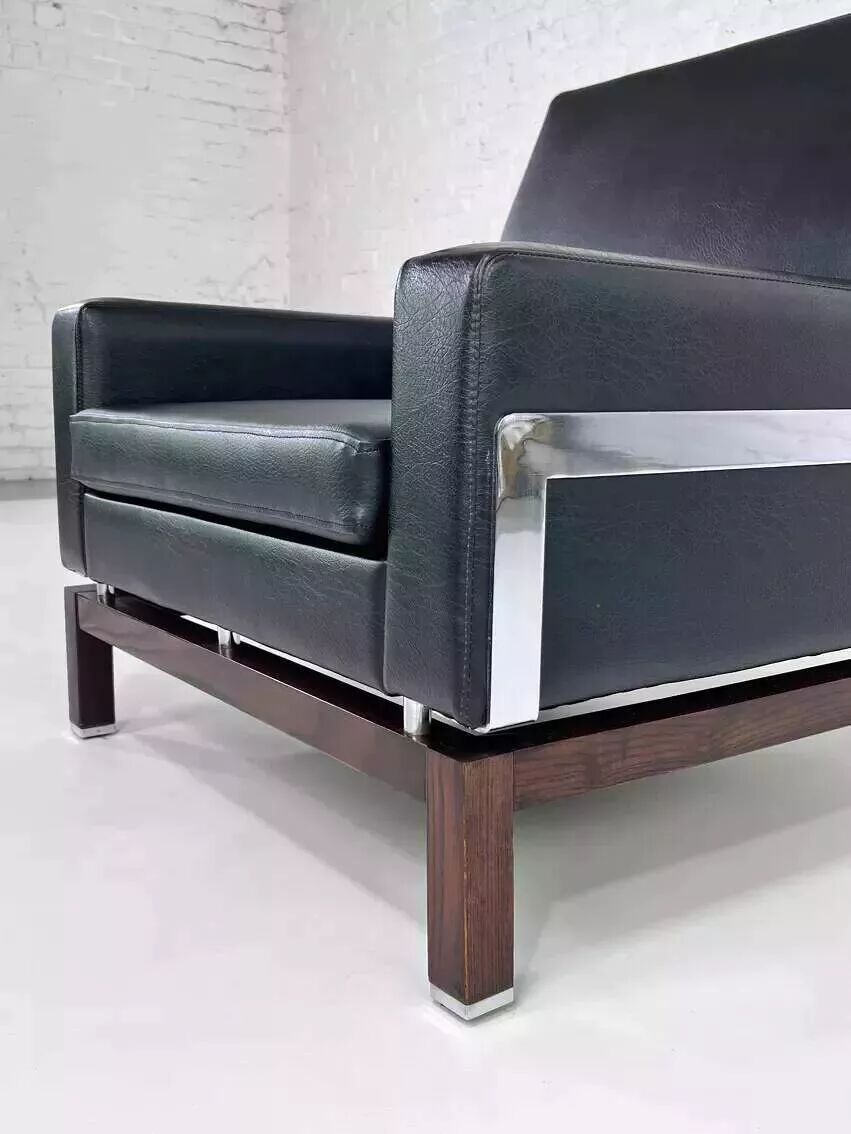Pair of 50s-60s armchairs in imitation leather, wood and chrome