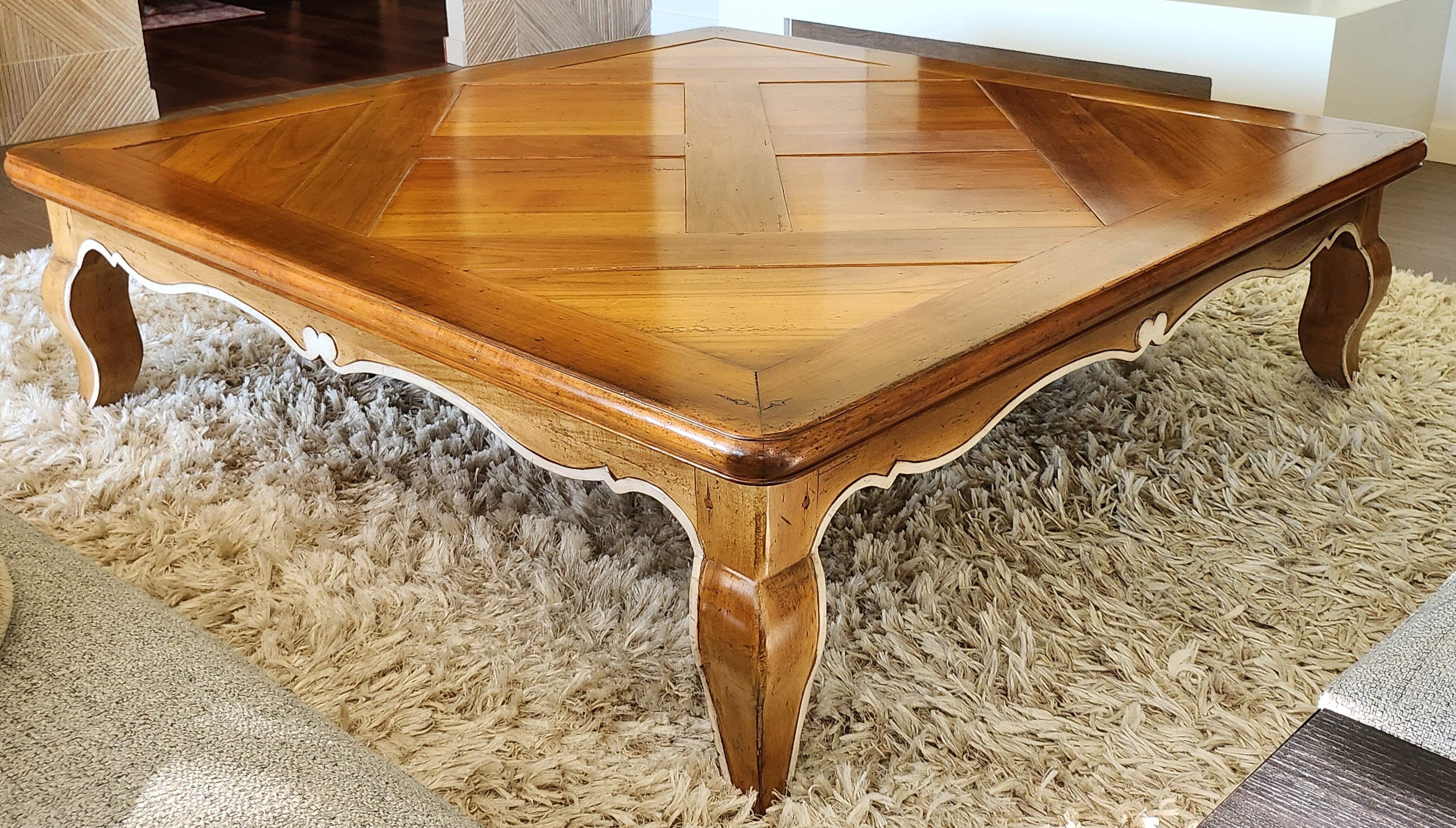 Square coffee table in cherry Roche Bobois