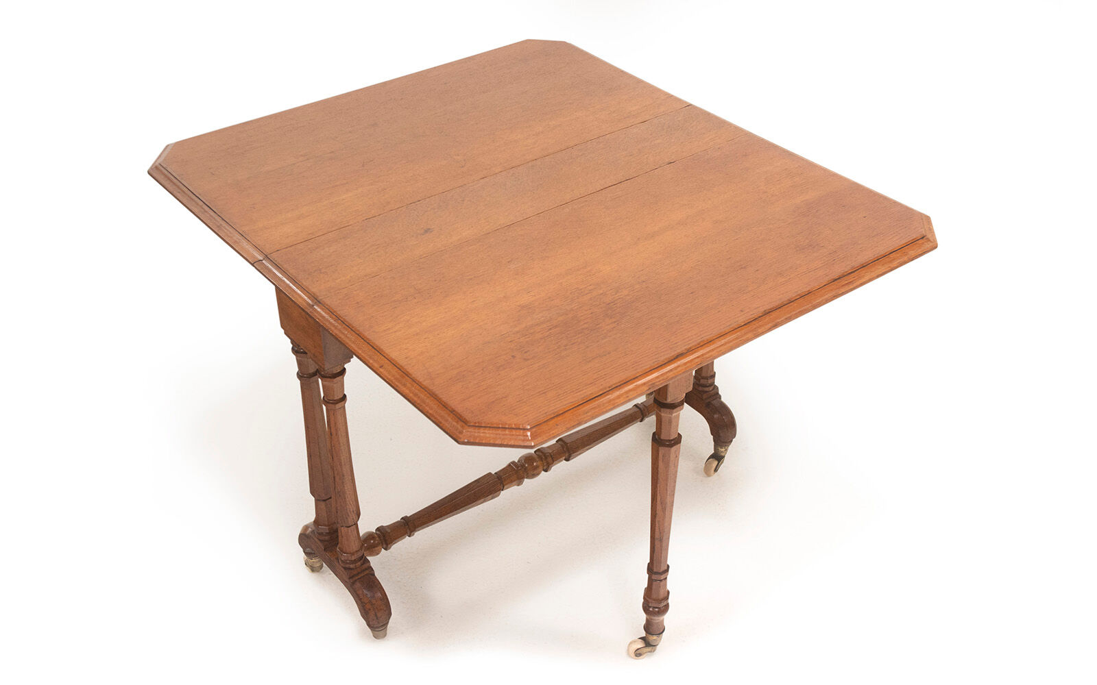 Arts & Crafts oak sutherland drop leaf dining table