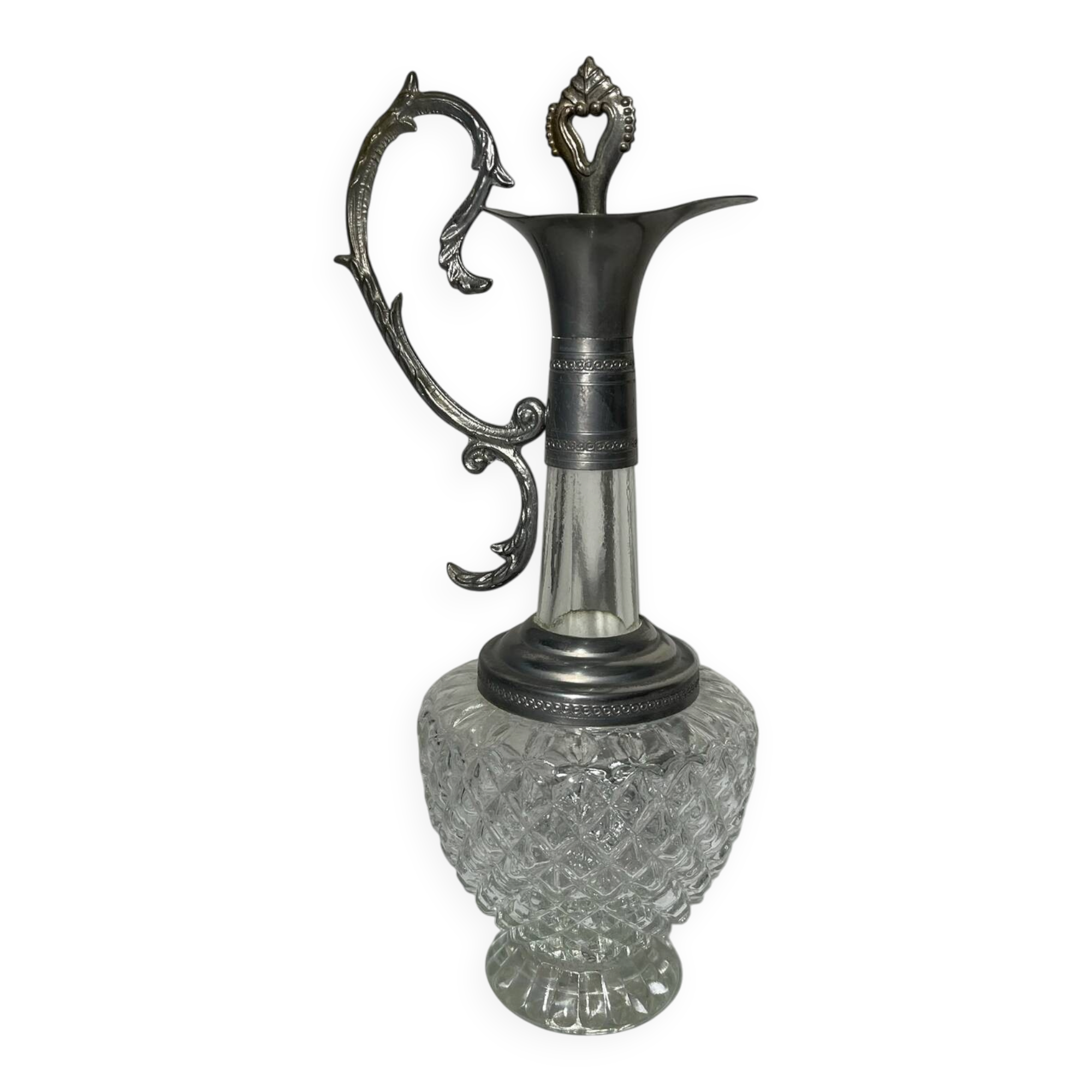 Vintage glass decanter with cut design and silver-plated metal, stopper included.