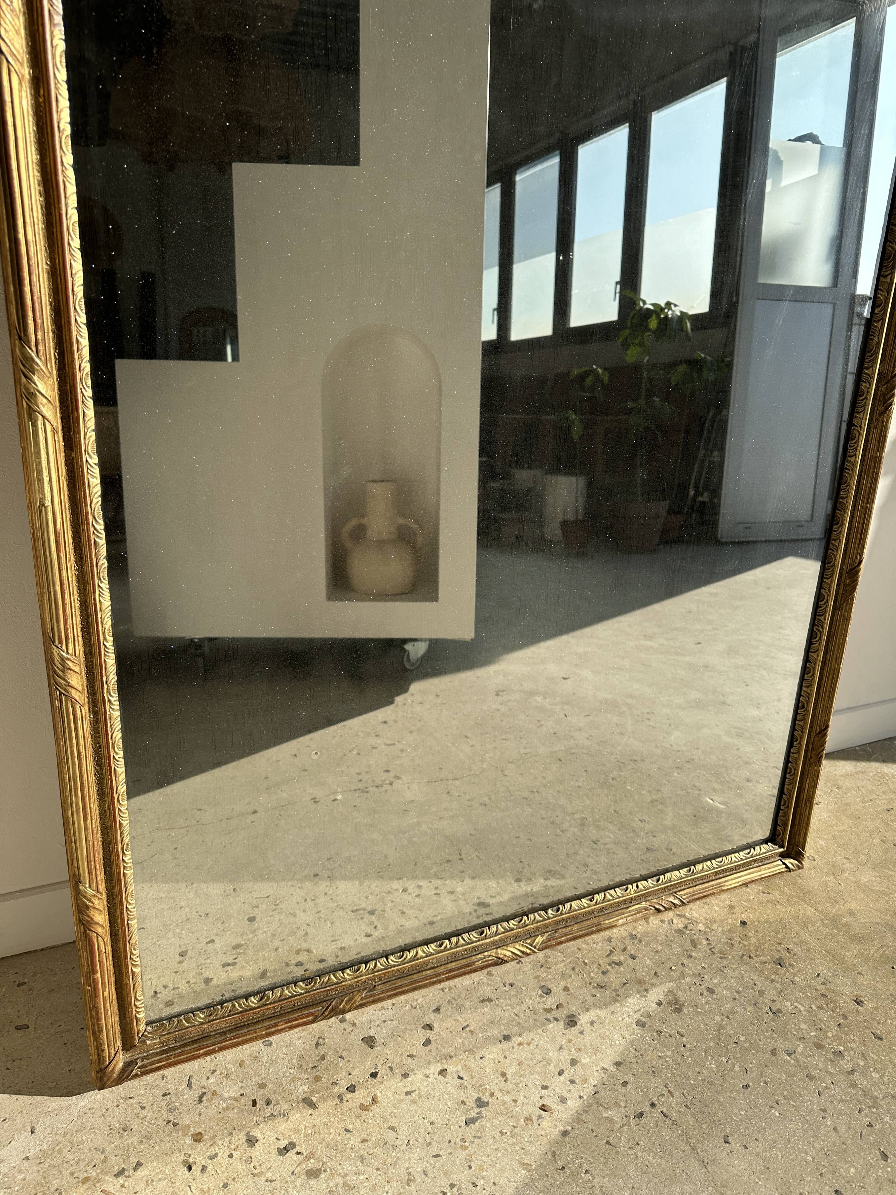Large gilded mirror 19th century rounded corners mercury glass Louis XVI style