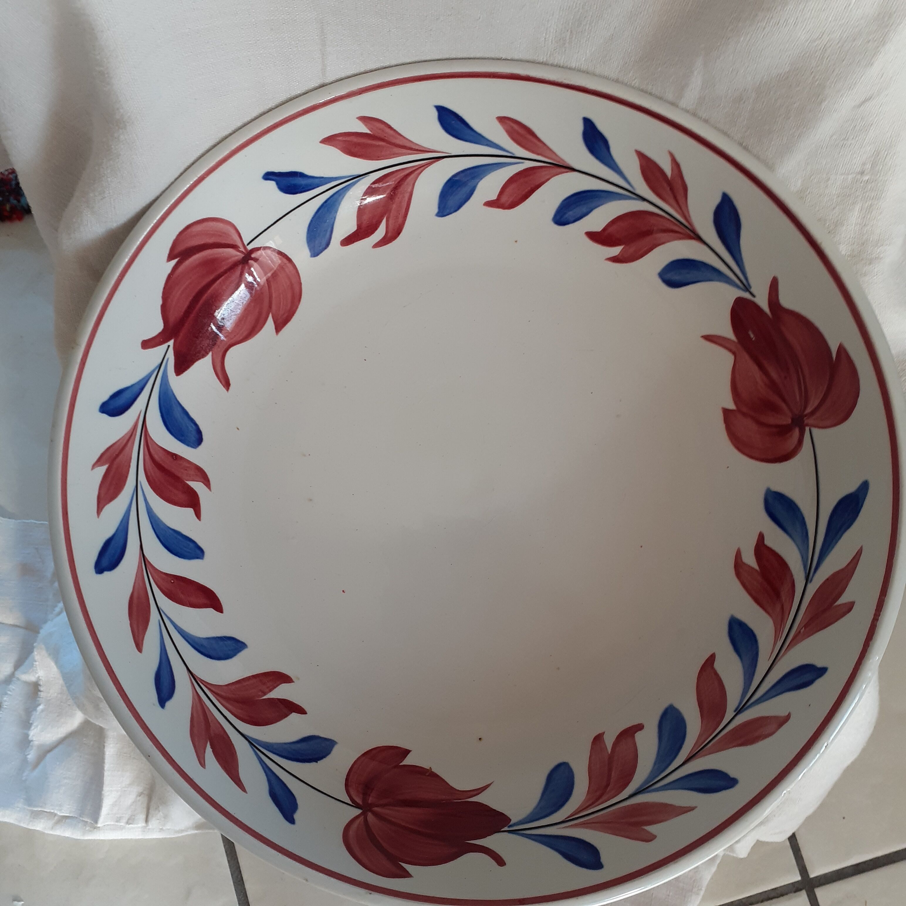 White background semi hollow dish with red flowers by St Amand