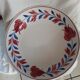 White background semi hollow dish with red flowers by St Amand
