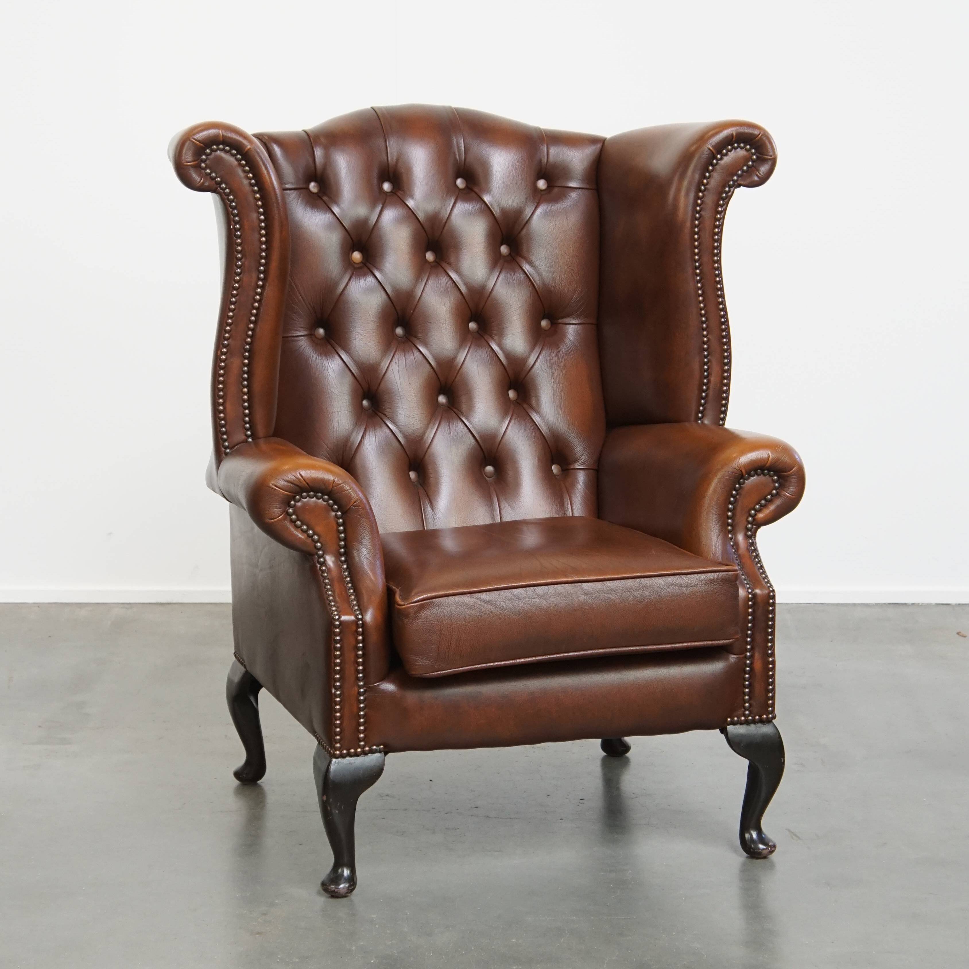Chesterfield wing chair in dark brown English cowhide