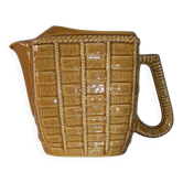 Jug with straw decoration