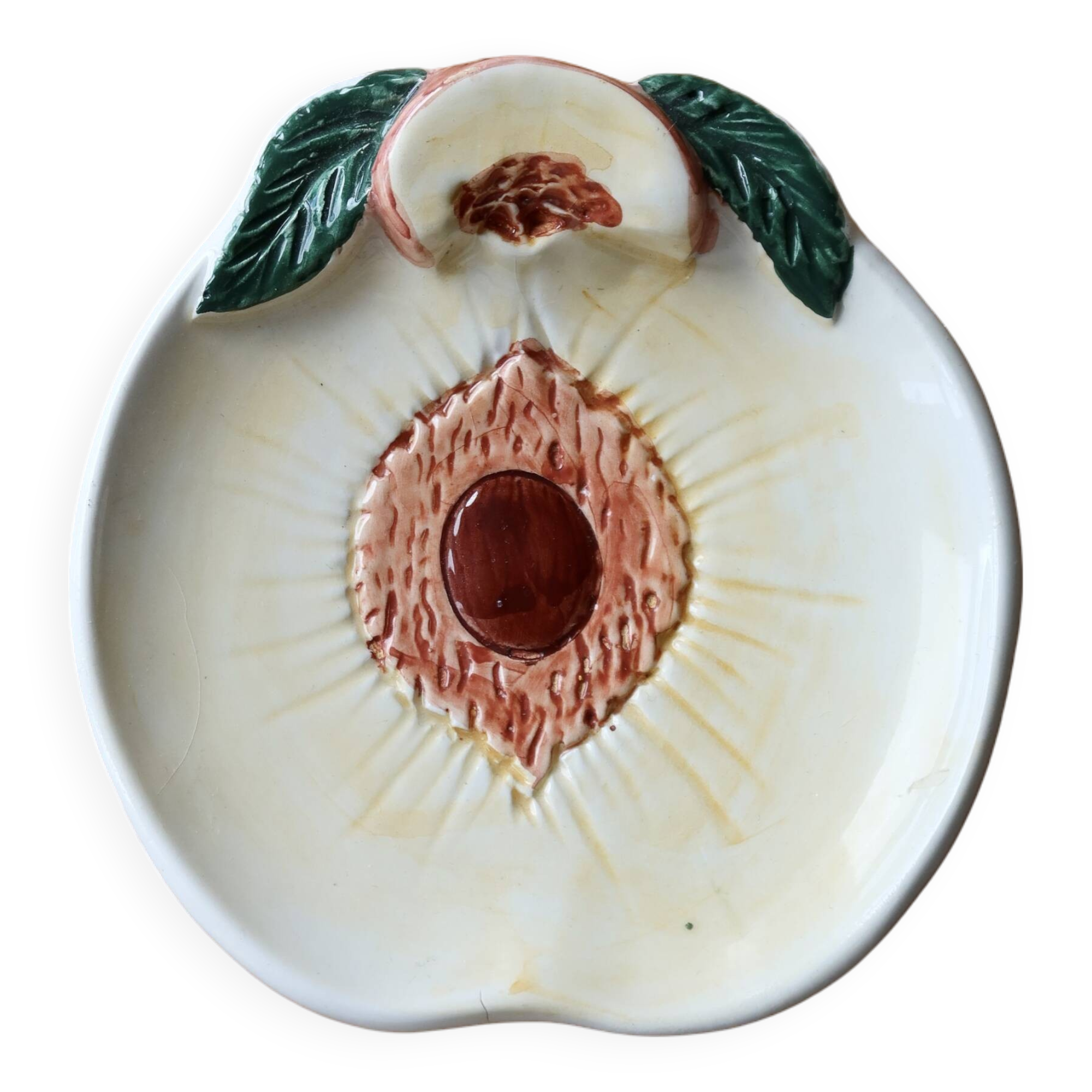 Small vintage barbotine bowl with peach-shaped pattern
