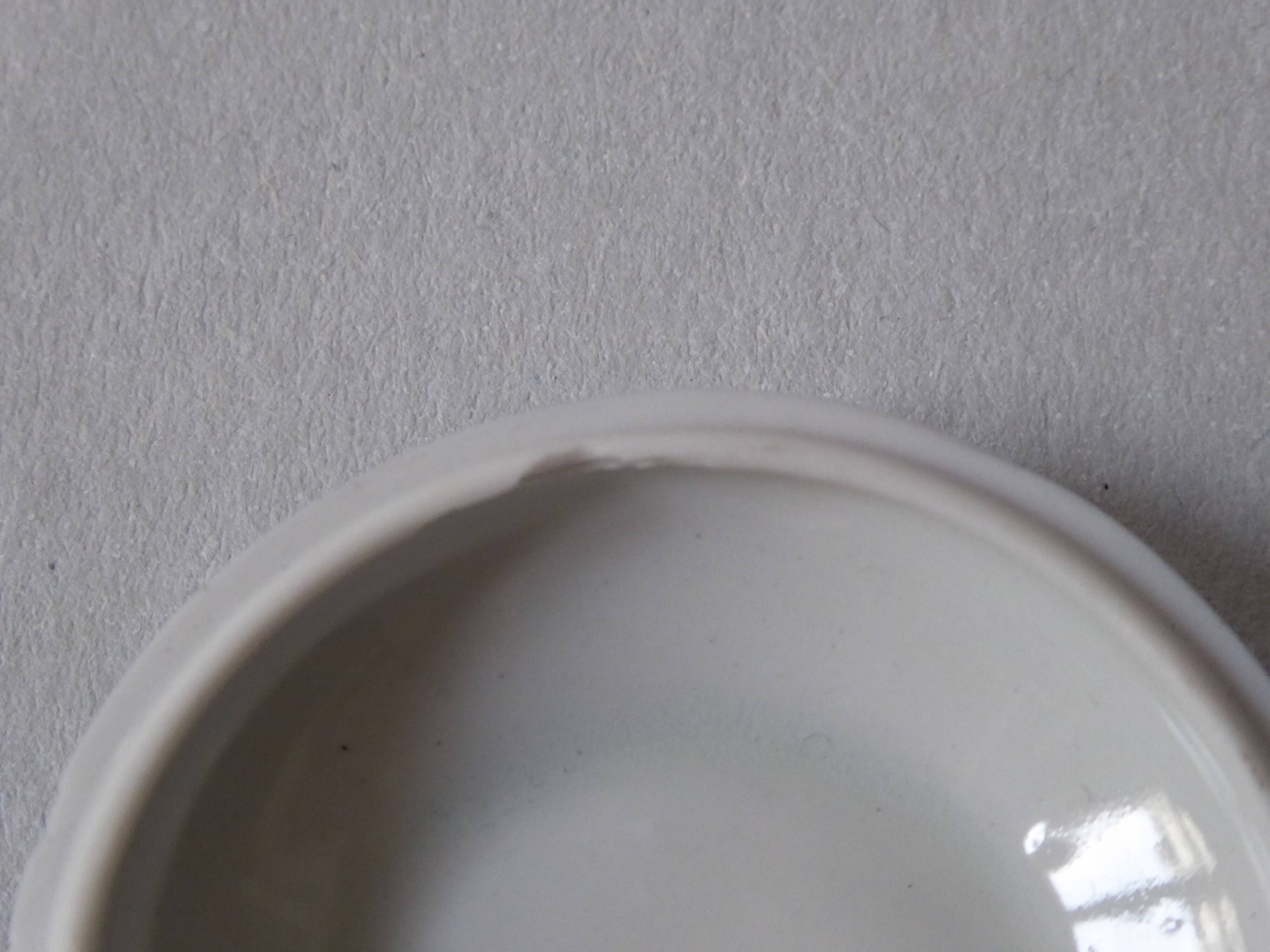 Porcelain pill box decorated with blue and white flowers