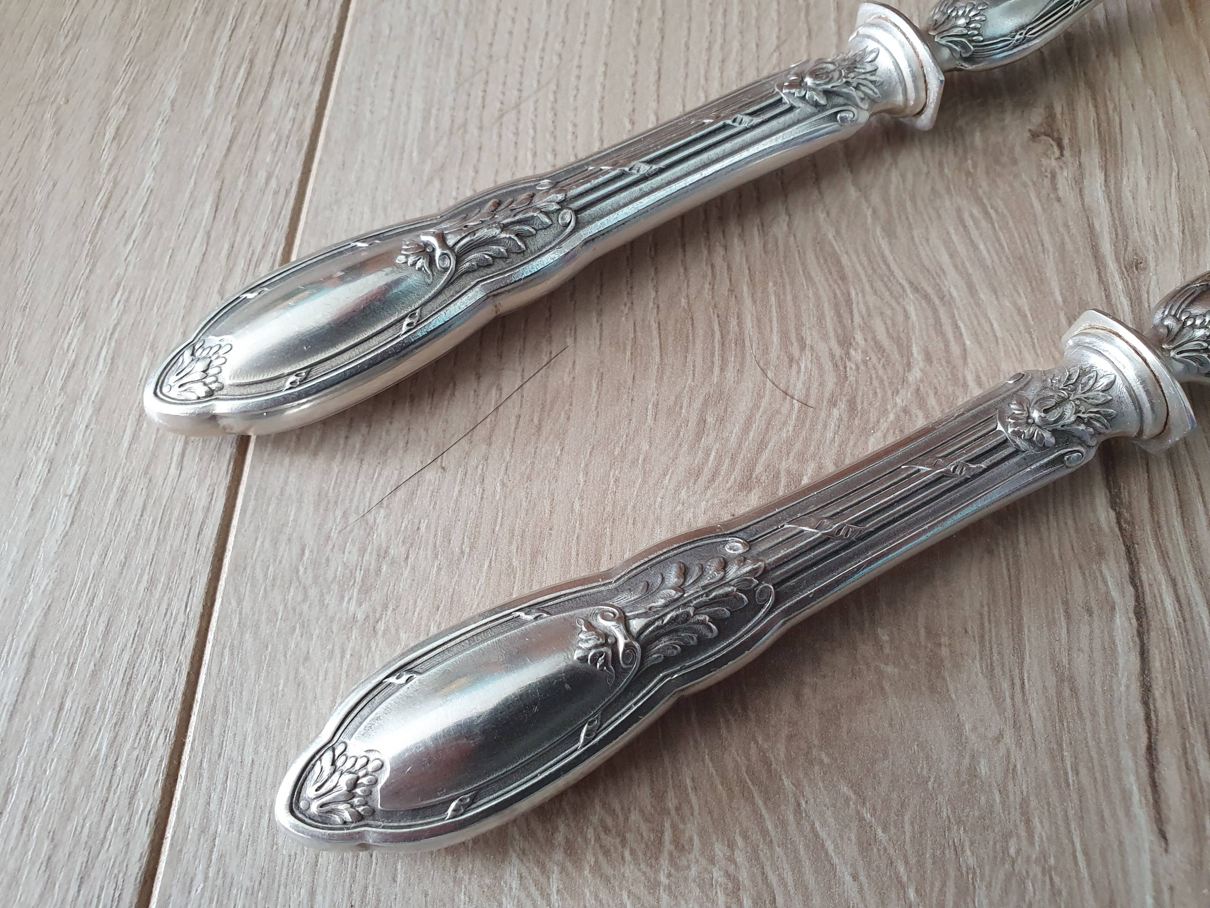Filled silver metal handle salad covers