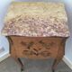 Pair of curved bedside tables in the Louis XV style with noble wood marquetry from the period.
