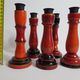 Set of five wooden candlesticks turned in the colors of "Pompeï"