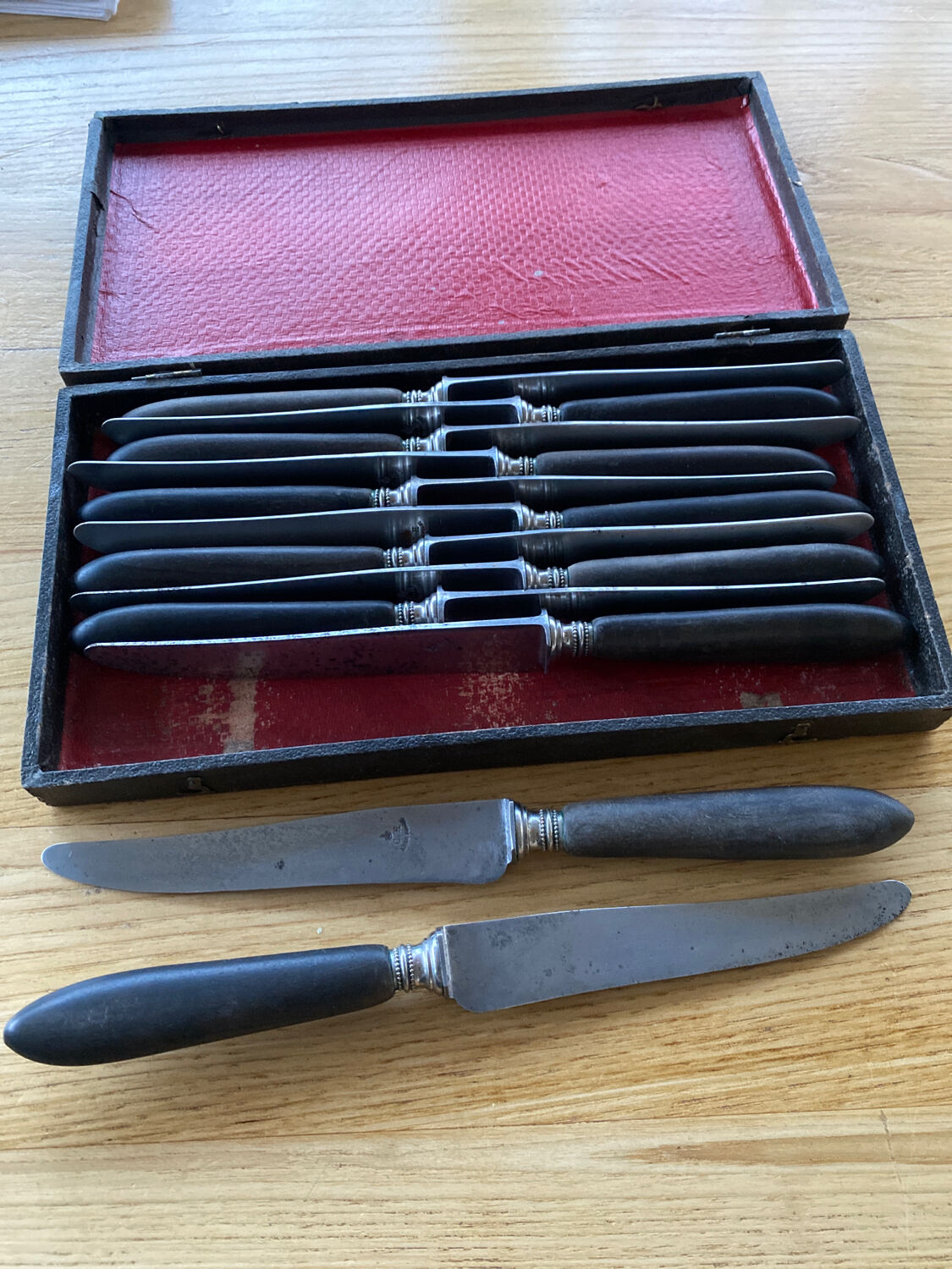 12 knives melted steel ebony handle