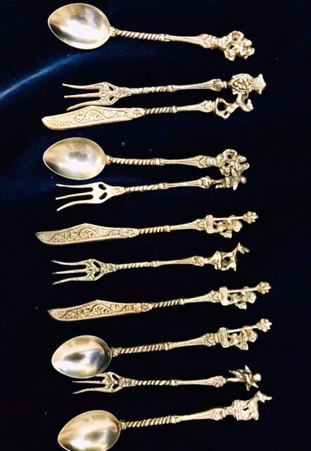 Set 11 of old cutlery with silver metal desert