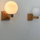 Pair of vintage wall lights, oak and opaline, France 1960
