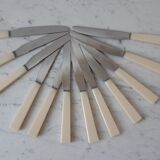 Ensemble de 12 couteaux en inox et bakélite "Yanid" années 60-70