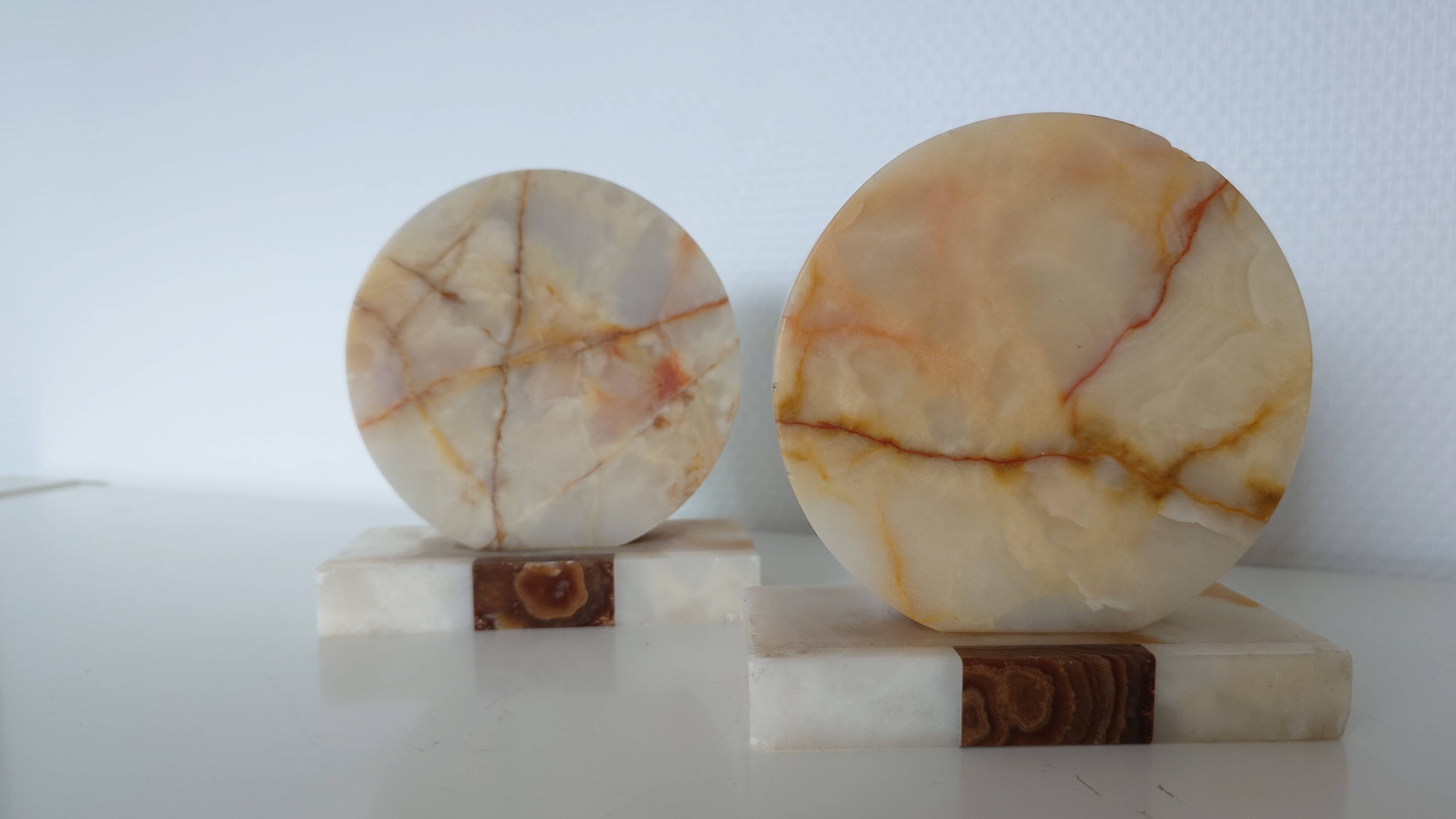 Pair of marble and onyx bookends, geometric design, Art Deco style.
