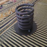 Spiral metal candle holder spring with candle, bronze appearance
