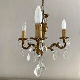 Chandelier with tassels and brass