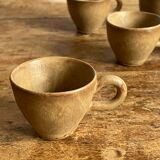 7 very small old sandstone coffee cups