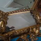 Miroir à pareclose doré fin XIX ème 130cmx85cm