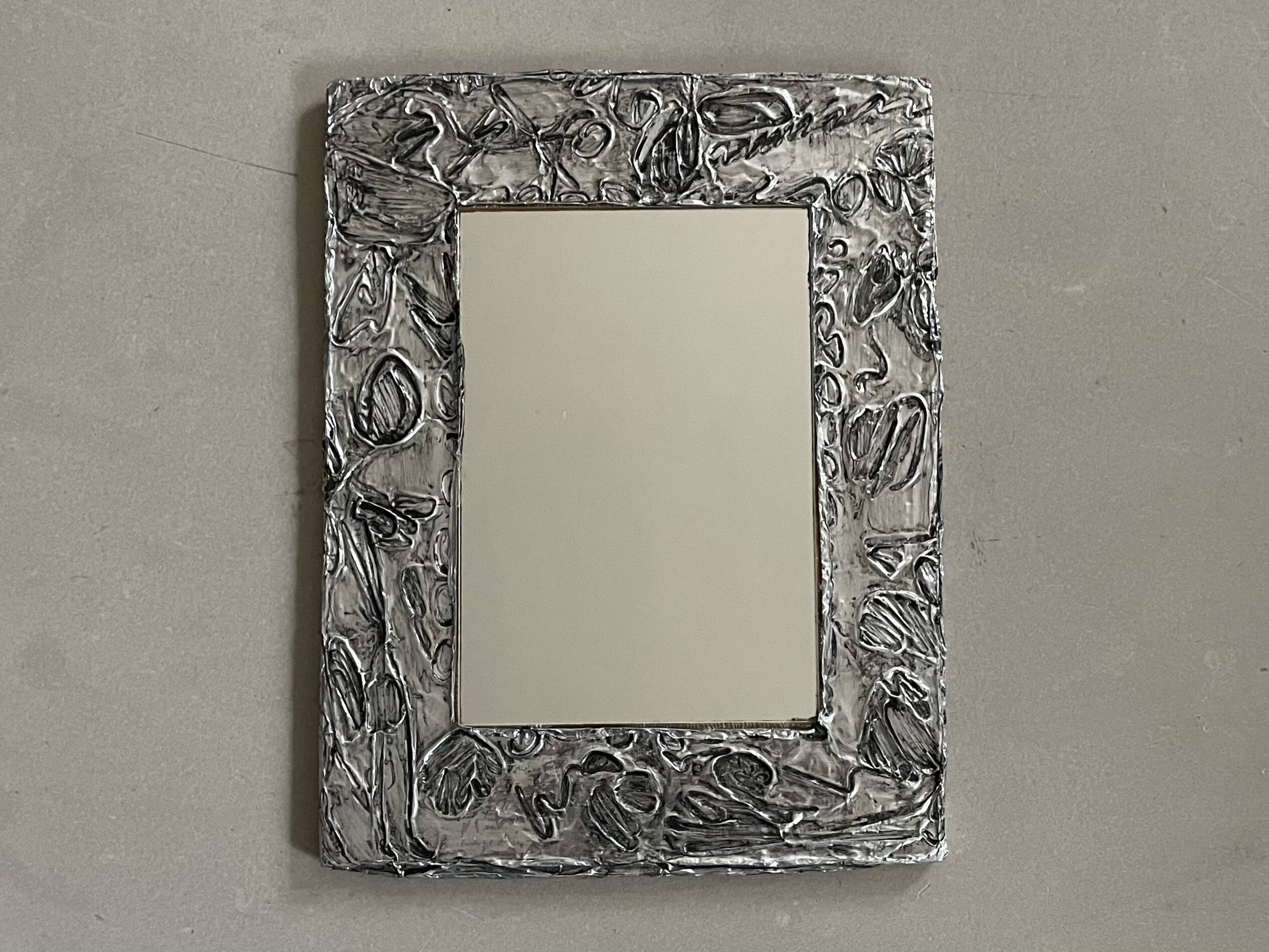 Vintage stamped mirror