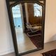 Miroir vintage glace biseautée en bois noir et doré