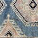 Tapis oriental fait main xxeme fond bleu 307 cm x 222 cm