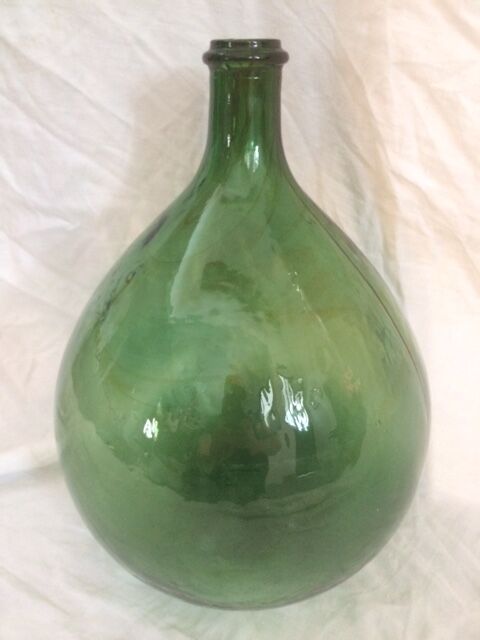 Demijohn with a beautiful glass mixing green and brown