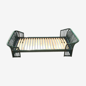 Green rattan bed