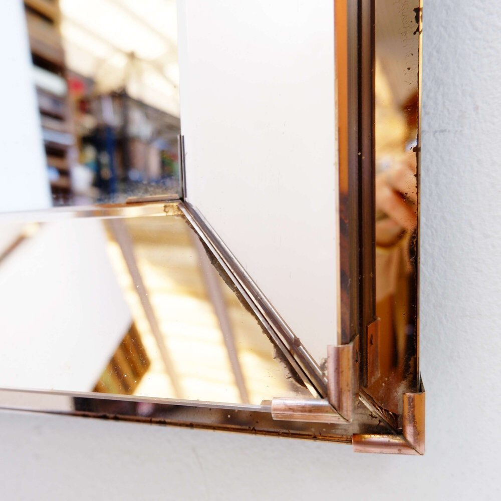 Rectangular mirror with pink parclose attributed to Jacques Adnet - circa 1940