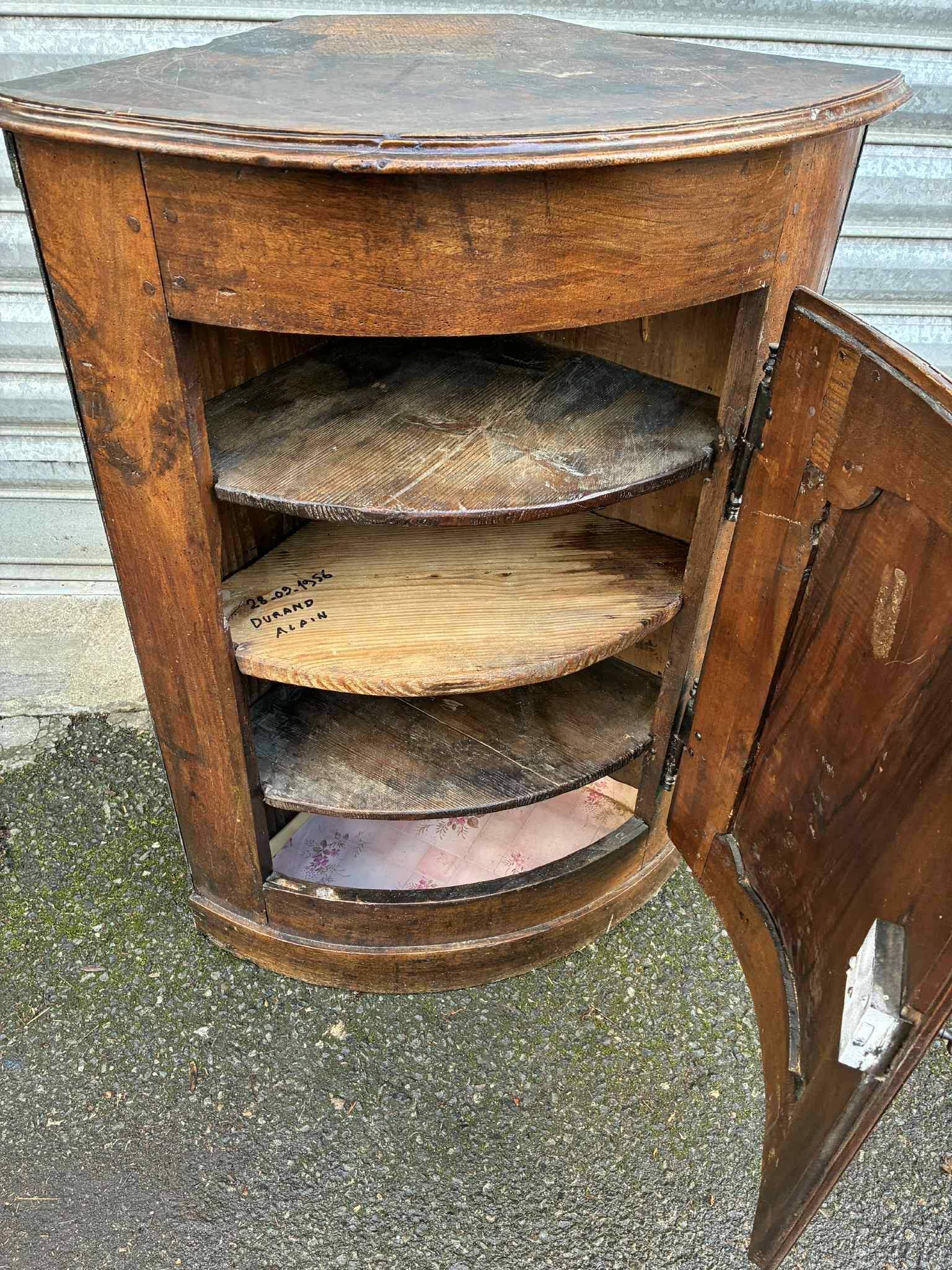 Small wooden corner accent table.