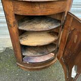 Small wooden corner accent table.