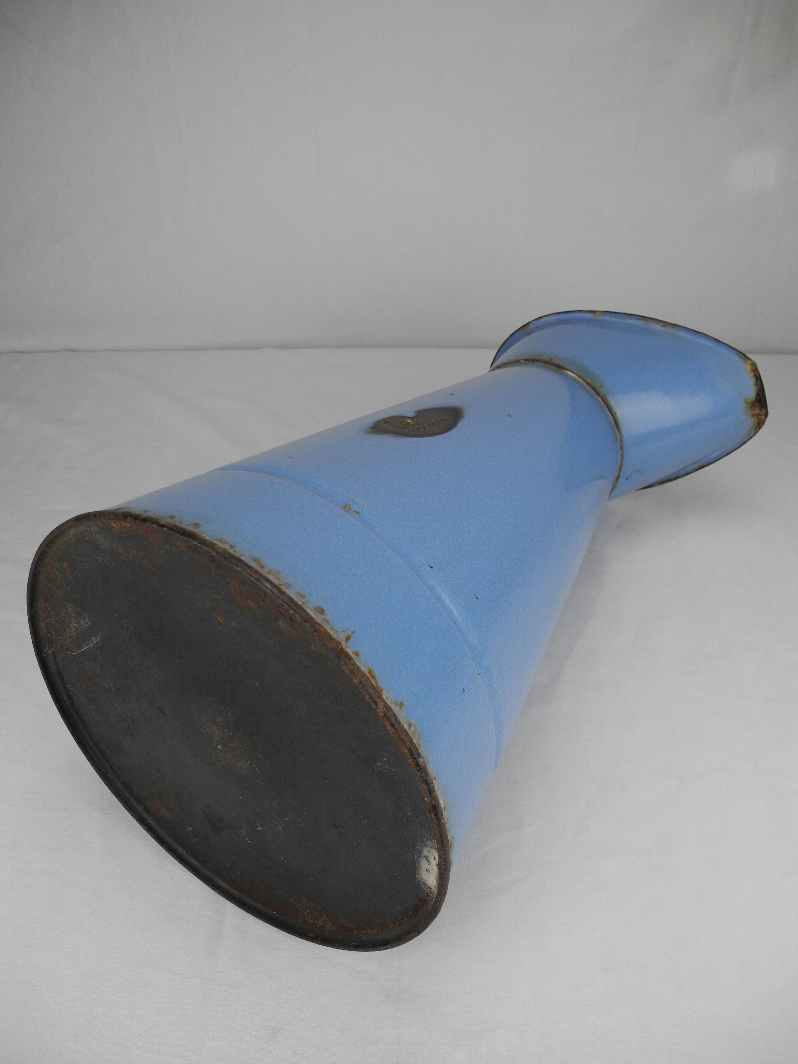 Old vintage enamelled sheet metal jug