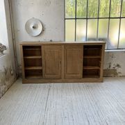 Large row of solid oak loom sliding doors