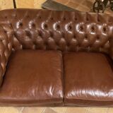 brown leather 2-seater Chesterfield sofa