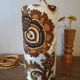 Vintage portable lamp with authentic seventies floral linen fabric.