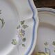 7 hand-painted earthenware dessert plates – France, 1950s