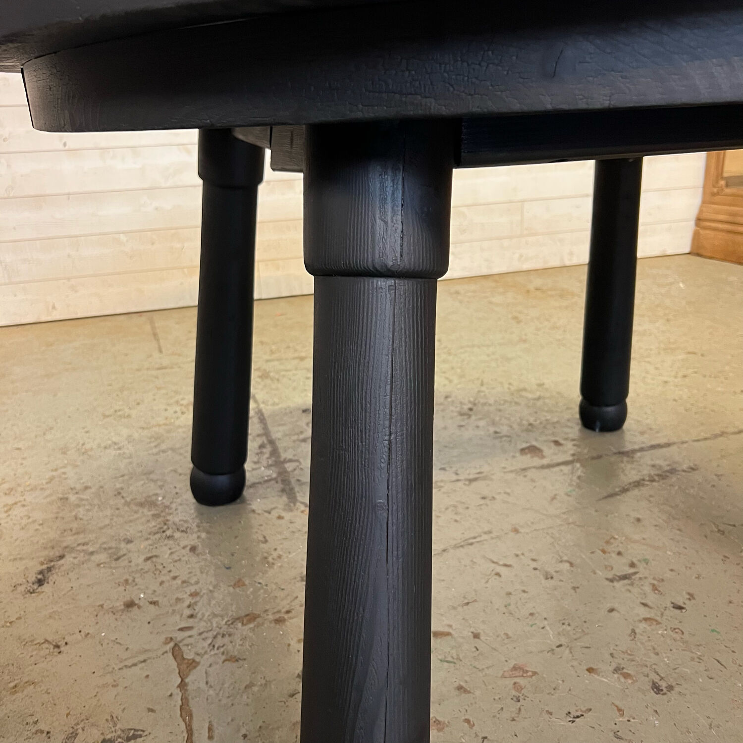 Brutalist round table in burnt wood yakisugi
